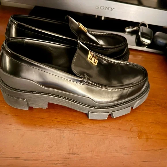 Givenchy Shiny Black Loafers with Gold Accent